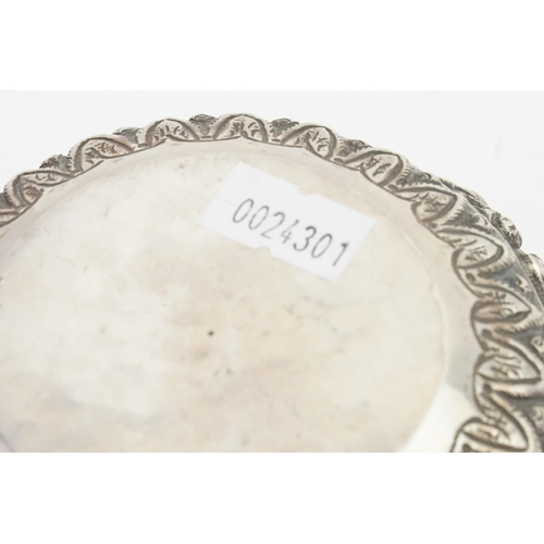 94 - A silver coloured white metal, Indian designed bon bon dish. Depicting various scenes. Weight 111g