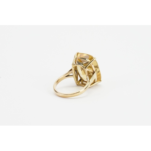 243 - A 9ct gold large Citrine set ring. Citrine size apprx 15.2mm x 19.8mm. Weight 6.7g. Size P.