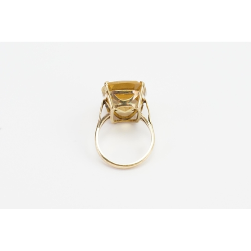 243 - A 9ct gold large Citrine set ring. Citrine size apprx 15.2mm x 19.8mm. Weight 6.7g. Size P.