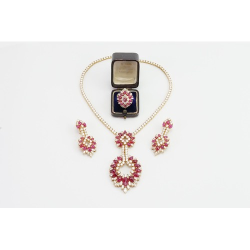 246 - An incredible 18ct diamond and ruby three-piece jewellery suite, consisting of 238 diamonds & 90 cab... 