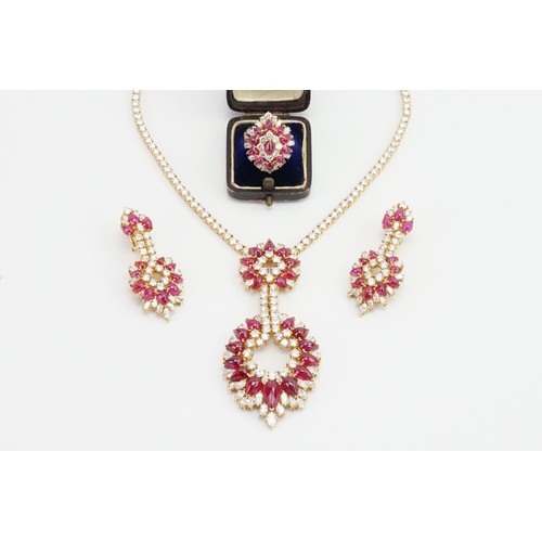 246 - An incredible 18ct diamond and ruby three-piece jewellery suite, consisting of 238 diamonds & 90 cab... 