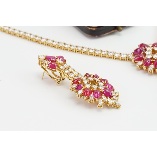 246 - An incredible 18ct diamond and ruby three-piece jewellery suite, consisting of 238 diamonds & 90 cab... 