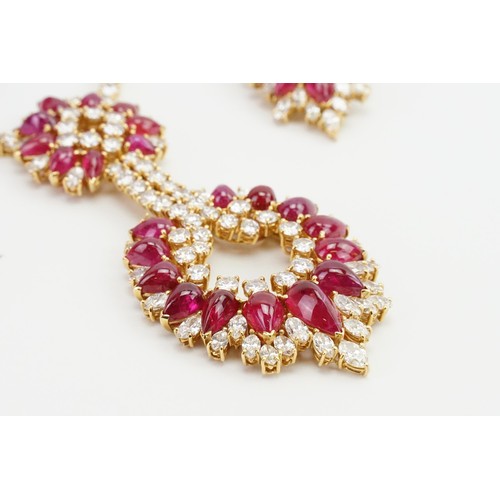 246 - An incredible 18ct diamond and ruby three-piece jewellery suite, consisting of 238 diamonds & 90 cab... 