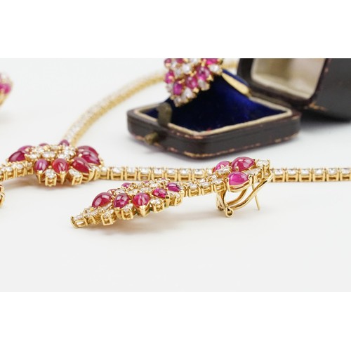 246 - An incredible 18ct diamond and ruby three-piece jewellery suite, consisting of 238 diamonds & 90 cab... 