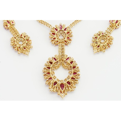 246 - An incredible 18ct diamond and ruby three-piece jewellery suite, consisting of 238 diamonds & 90 cab... 