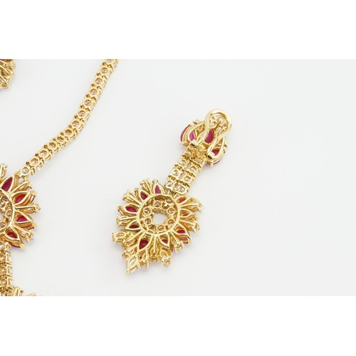 246 - An incredible 18ct diamond and ruby three-piece jewellery suite, consisting of 238 diamonds & 90 cab... 