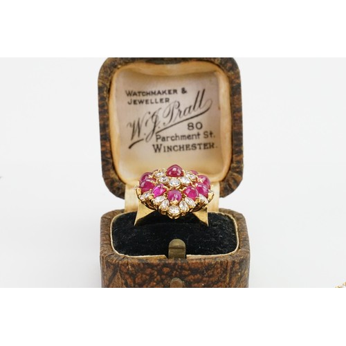 246 - An incredible 18ct diamond and ruby three-piece jewellery suite, consisting of 238 diamonds & 90 cab... 