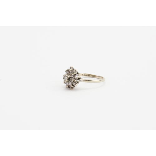 250 - A 18ct white gold diamond set ring, in the cluster form. Set with 17 diamonds, the largest 0.07ct. W... 