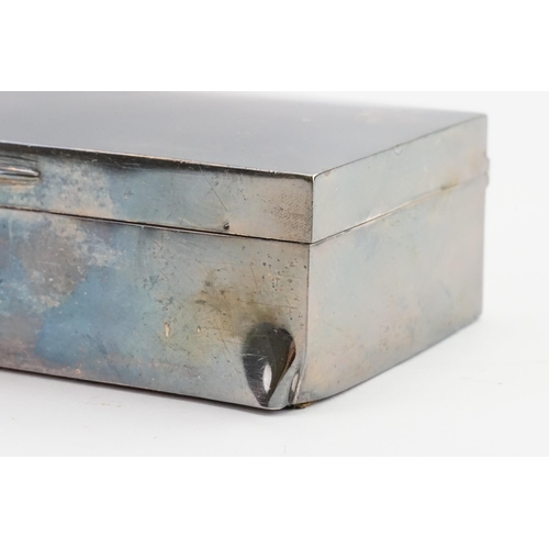 119 - A silver 1893 cigar box. Decorated with a stag head crest. Size 20cm x 8.5cm x 4.5cm.