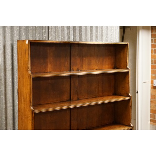 514 - A Late 19th Century Waterfall Design Bookcase with Reeded & Cut Frontage, fitted two drawers & resti... 