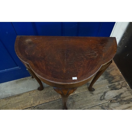 529 - A Cuban Mahogany Veneered & Cross Banded Shaped Topped Lamp Table resting on Pad Feet. Measuring: 59... 