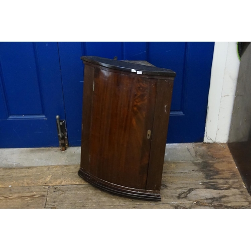 530 - An Antique Mahogany Corner Cupboard of Bow Shaped Form. Measuring: 35cms Deep x 69cms High.