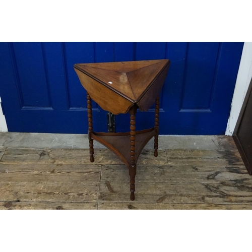 537 - A Victorian Mahogany Drop Flap Occasional Table resting on turned legs & under Tier. Measuring: 54cm... 