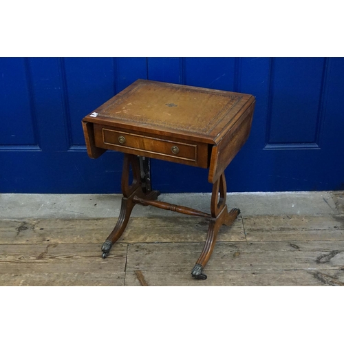 548 - A Miniature Mahogany Drop flap sofa coffee table resting on swept out legs with a leather inset.