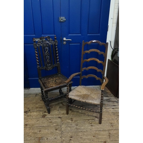 549 - A low down Rush seated fireside chair with open arms and an Edwardian Oak Barley twist hall chair.