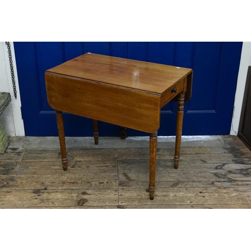 555 - A Victorian Drop flap Pembroke table fitted with a drawer & resting on turn legs. Measuring: 77cm x ... 