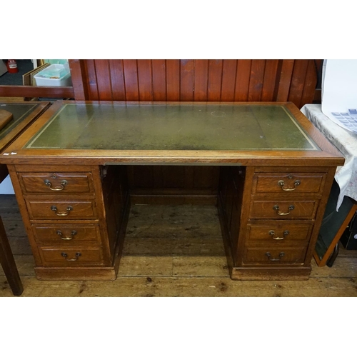 558 - A 1920s Panel Sided Oak Office Desk fitted with Drawers & a Gilt Leather Top. Measuring: 80cms deep ... 