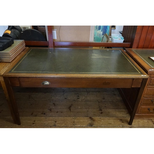 559 - An Oak Library Table fitted with a Large Single Drawer & resting on square legs. Measuring: 152cms a... 