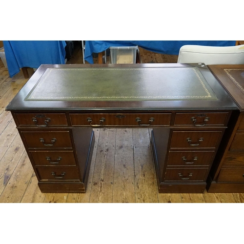 561 - A Reproduction Mahogany Pedestal Desk with with Drawers. Measuring: 121cms across x 60cms deep x 76c... 