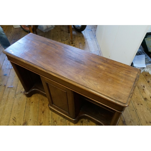 566 - A Victorian Mahogany Butler's Sideboard with recessed end cupboards & a panelled door.