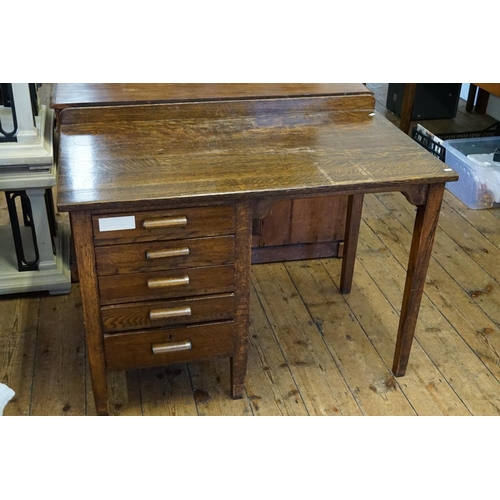 567 - A 1920s Quarter Cut Oak Office Desk fitted with a Left Hand Set of Drawers. Measuring: 108cms across... 