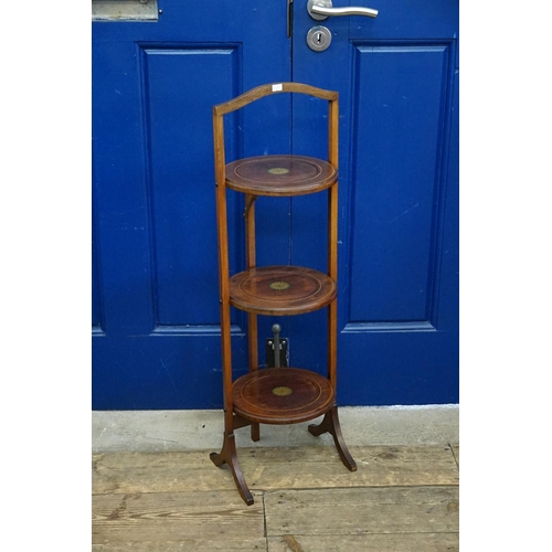 586 - An Edwardian Mahogany & Box Wood inlaid Folding Three Tier Cake Stand. Measuring: 86cms High.