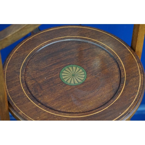 586 - An Edwardian Mahogany & Box Wood inlaid Folding Three Tier Cake Stand. Measuring: 86cms High.