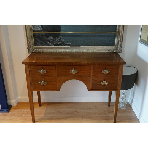 590 - A Regency Mahogany & Line inlaid Sideboard resting on square legs, fitted drawers & Cupboards, Shell... 