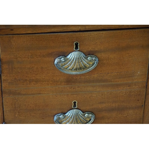 590 - A Regency Mahogany & Line inlaid Sideboard resting on square legs, fitted drawers & Cupboards, Shell... 