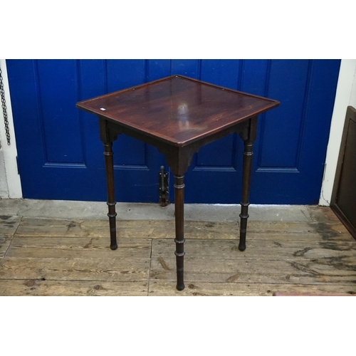 591 - A Late 19th Century Mahogany Aesthetic designed Card Table resting on turned legs. Measuring: 61cms ... 