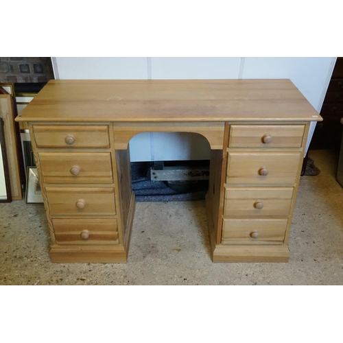 593 - A Modern Pine Dressing Table fitted graduated Drawers. Measuring: 121cms across x 50cms deep x 77cms... 