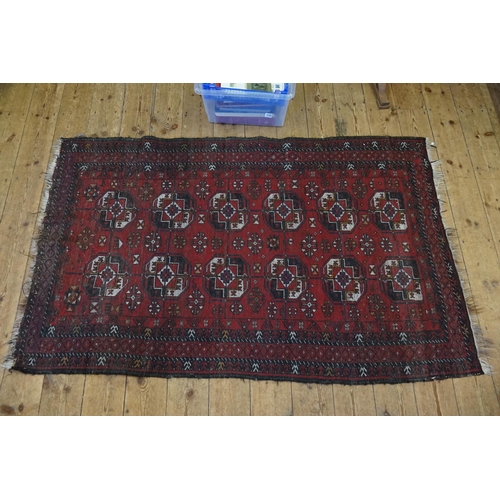 611 - A Red Ground Central Gold pattern & Medallion Rope Pattern Carpet. Measuring: 194cms x 117cms.