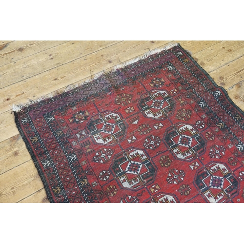 611 - A Red Ground Central Gold pattern & Medallion Rope Pattern Carpet. Measuring: 194cms x 117cms.