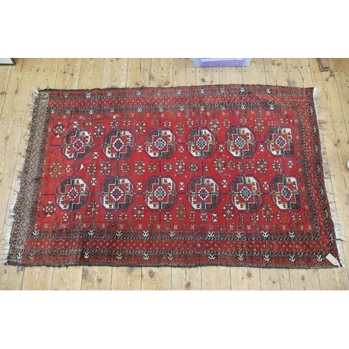 611 - A Red Ground Central Gold pattern & Medallion Rope Pattern Carpet. Measuring: 194cms x 117cms.