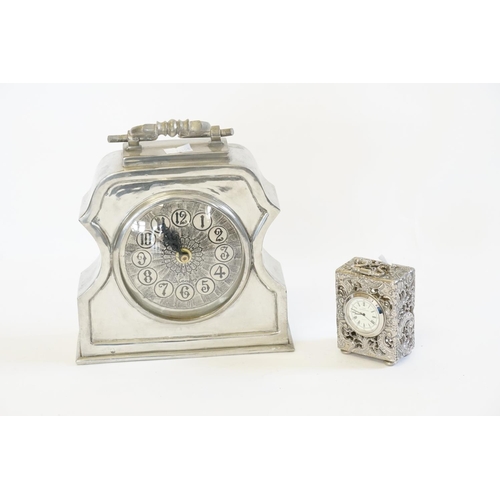 203 - A Pewter Cased Bracket clock, stamped 'De Cempos' Etaim. A first impression Carriage Clock in a Repo... 