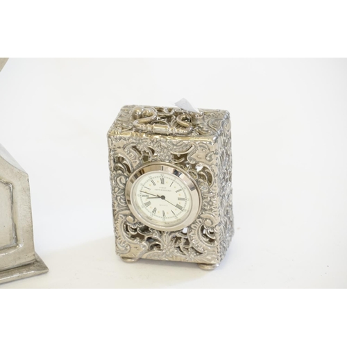 203 - A Pewter Cased Bracket clock, stamped 'De Cempos' Etaim. A first impression Carriage Clock in a Repo... 