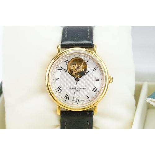 192 - A gentleman's gold plated stainless steel Frederique Constant Heart Beat watch. Original box. Ref 3A... 