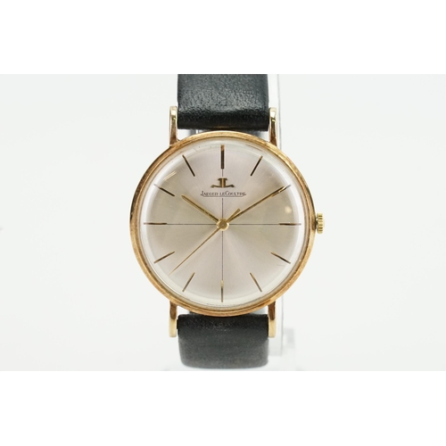 198 - A 1960's 9ct gold silver faced Jaeger-Le Coultre watch. Inscription on the back. Number 9194. Along ... 