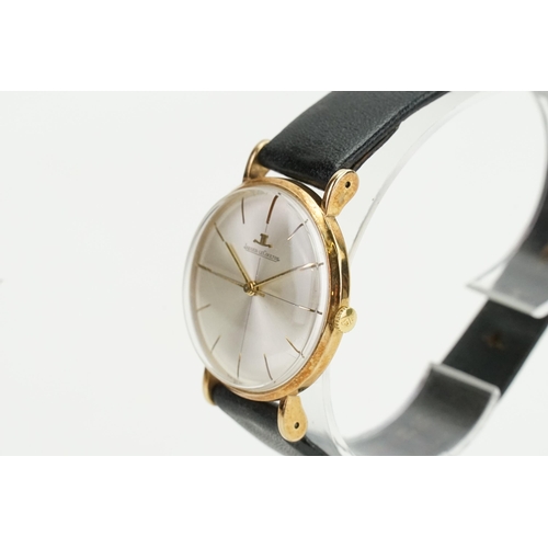 198 - A 1960's 9ct gold silver faced Jaeger-Le Coultre watch. Inscription on the back. Number 9194. Along ... 