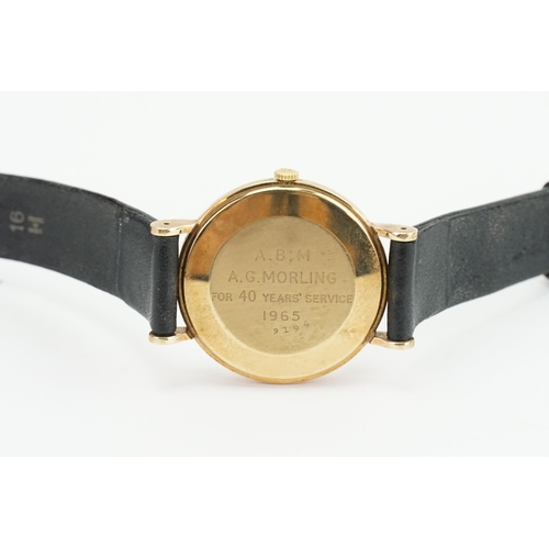 198 - A 1960's 9ct gold silver faced Jaeger-Le Coultre watch. Inscription on the back. Number 9194. Along ... 