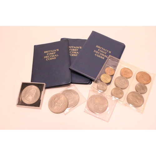 220 - 3 x U.K. First Decimal Coins Booklets, 4 x Commemorative Crowns along with a sheet of 1950s U.K. Coi... 