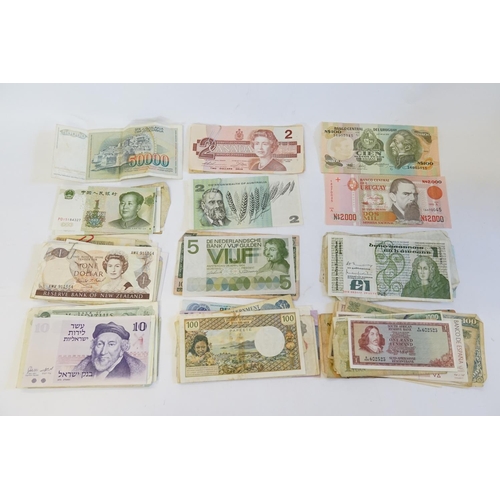 242 - A Collection of Worldwide Old Bank Notes to include Canada New Zealand, Israel, Uruguay, Yugoslavia,... 