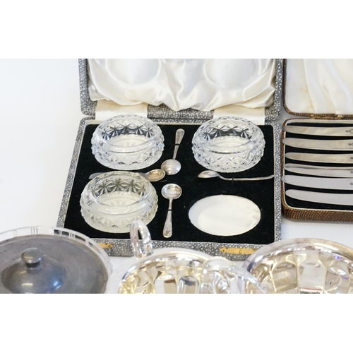 63 - A collection of plated items, to include a teapot, silver topped pot etc.