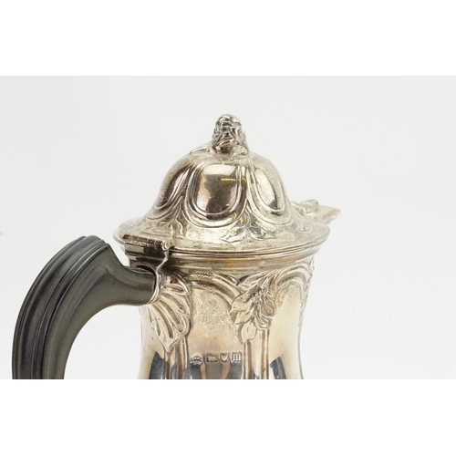 32 - A 1907 art nouveau design coffee pot made by Wakely & Wheeler. With carved bakerlite handle. Weight ... 