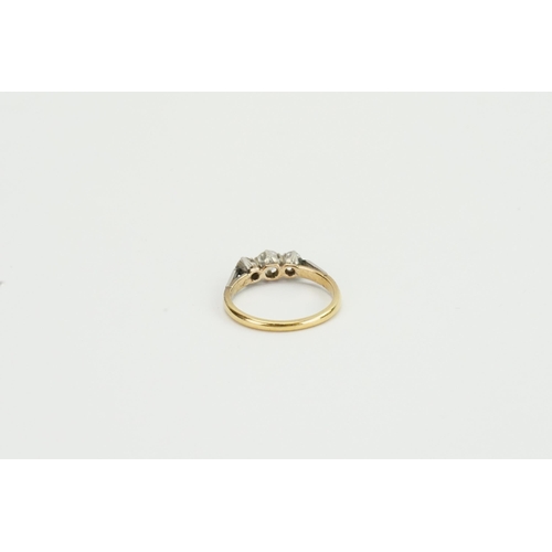 95 - A 18ct gold platinum topped three stone diamond ring. Largest stone approx. 0.25ct. Weight 2.7g. Siz... 