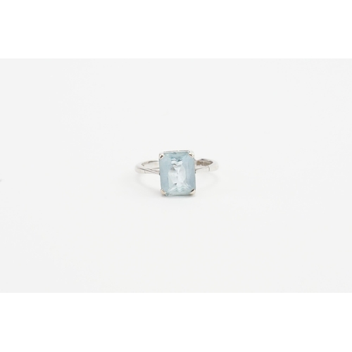 122 - A 9ct white gold emerald cut aquamarine ring. Size M. Aquamarine size approx 7.8mm x 9.8mm. Weight 2... 