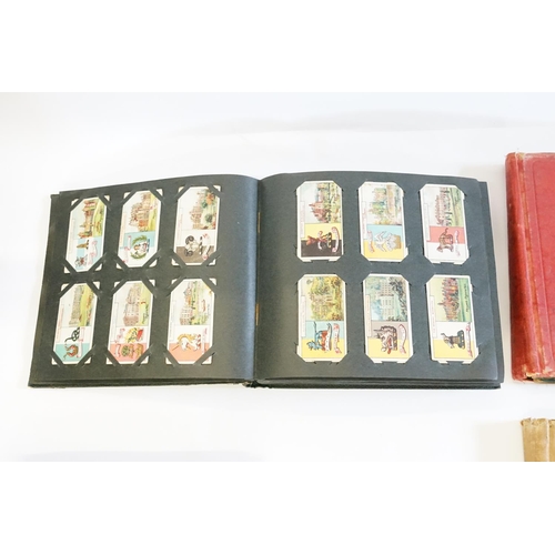 257 - A Collection of Cigarette Cards to include Cry's of London, Dogs, Flowers, Cars, Fish, Navy, Borough... 