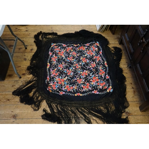 299 - A Chinese Black & Floral embroidered Shawl with Long Fringe.