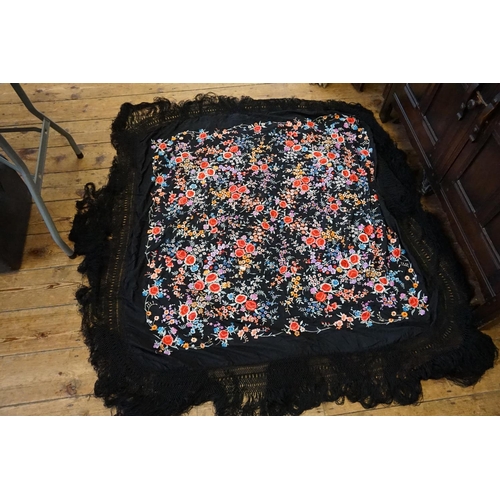 300 - A Chinese Black & Floral embroidered Shawl with Long Fringe.