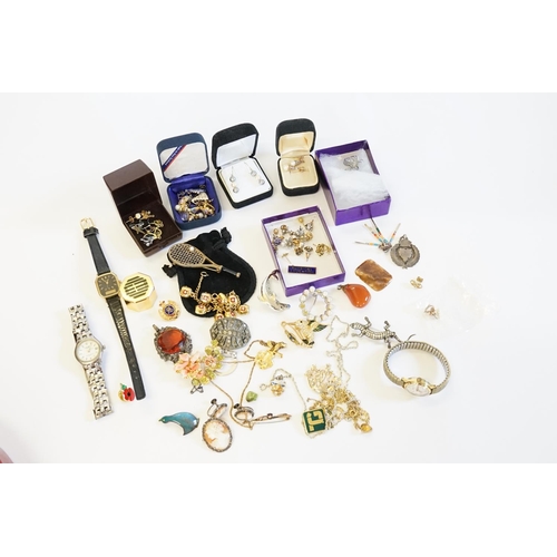 157 - A Collection of Jewellery to include Silver Coloured chains, a Fob, etc.